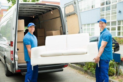 House removal team helping with a move in Ilford on a residential street
