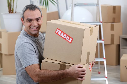 Furniture pick-up team helping with bulky sofa removal in Ilford