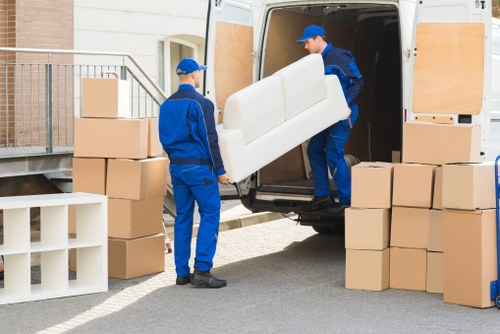 Removal van and moving boxes prepared for a local Ilford house move