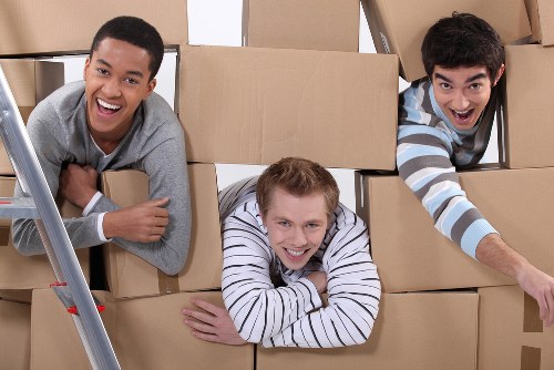 House movers loading furniture for a home move in Ilford