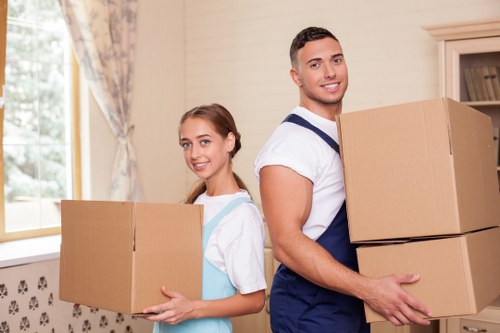 Loading furniture into a van for a house move in Ilford