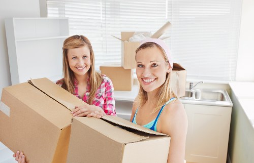 Packed office equipment and furniture ready for relocation