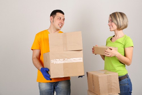 Boxes and wrapped furniture ready for transport during a house removal in Ilford